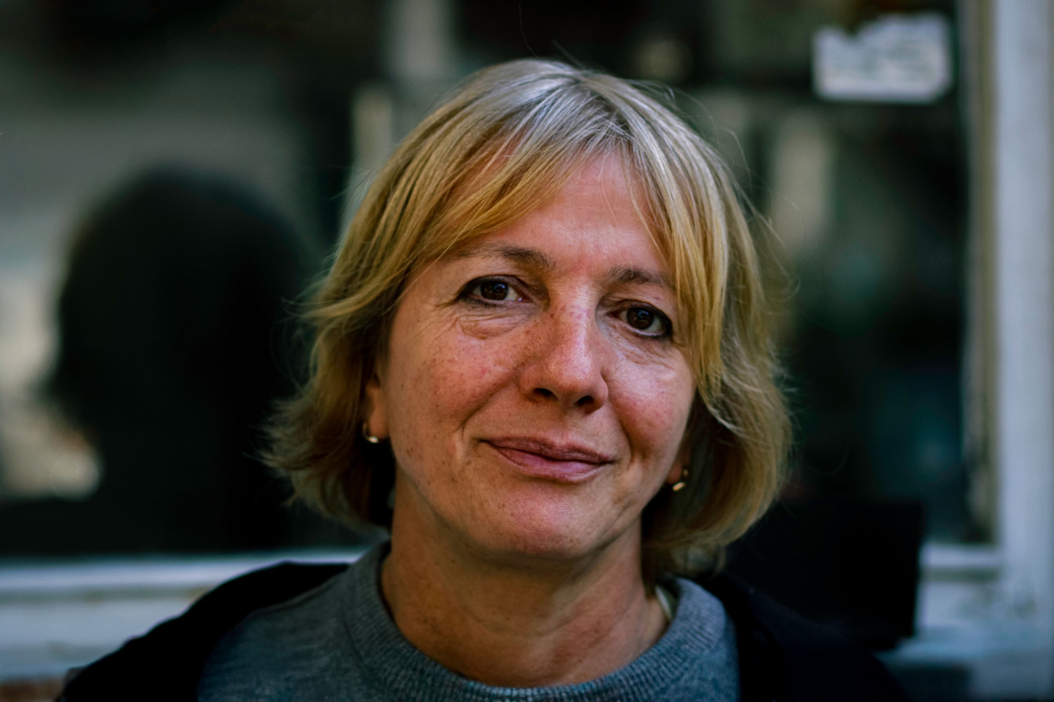 A woman smiling